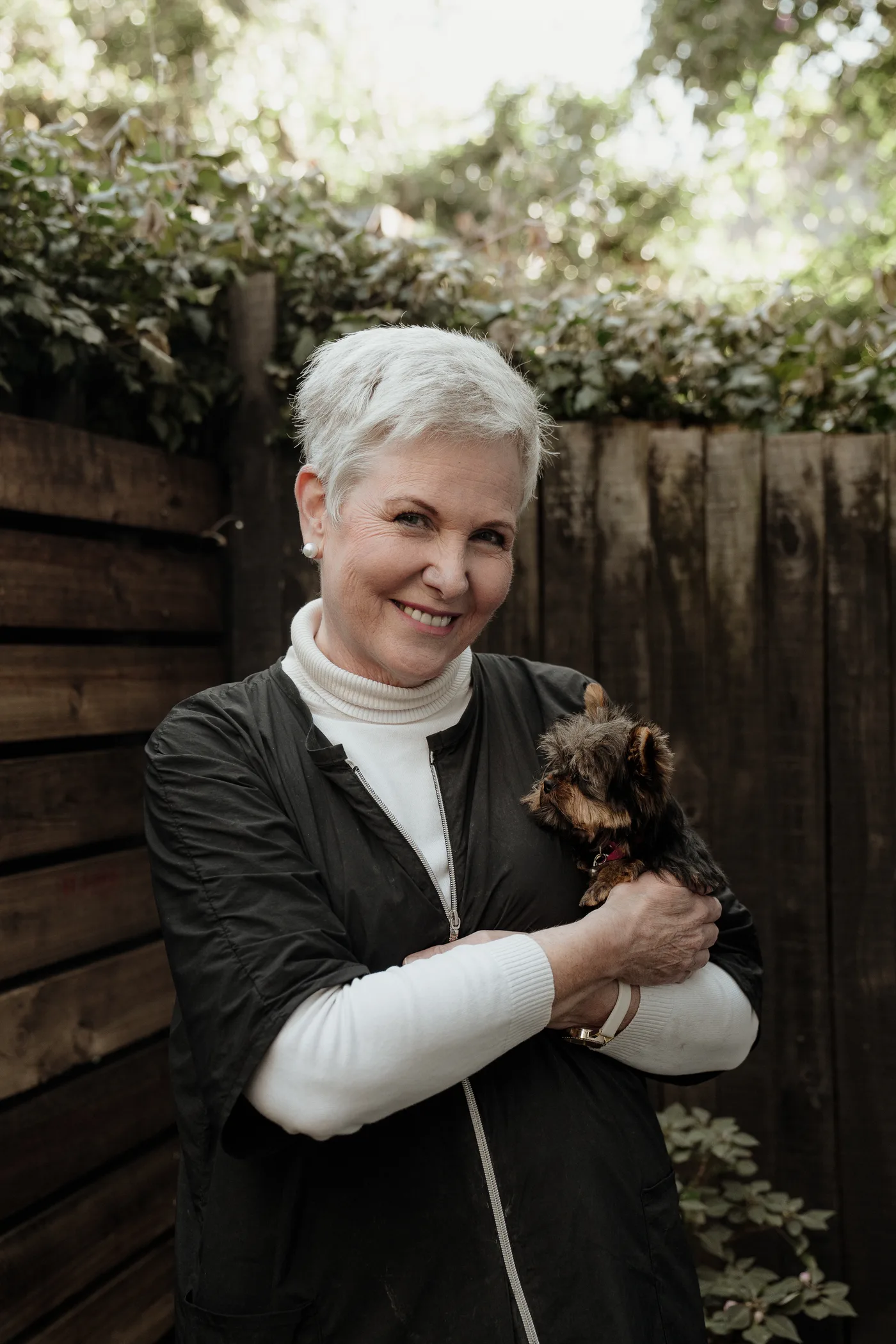 Erika de Villiers with a client Yorkie at Polished Furbabies